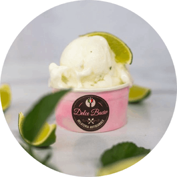A cup of ice cream with limes